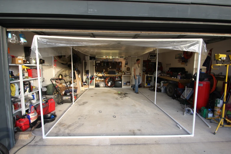 a garage full of items, including fire hydrant and shelves