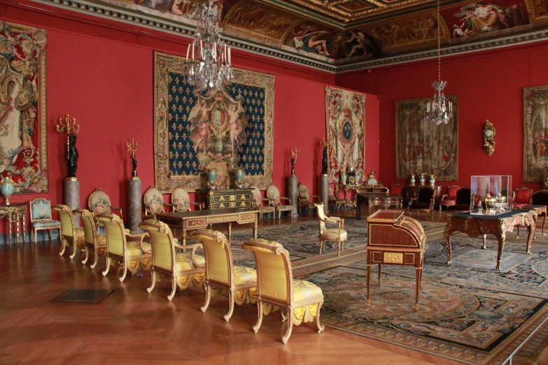 an elegantly decorated room with tables and chairs