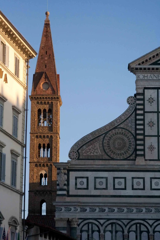 an old building is shown with a clock tower