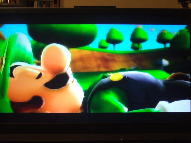 an animated screen on a tv with a cow looking at it