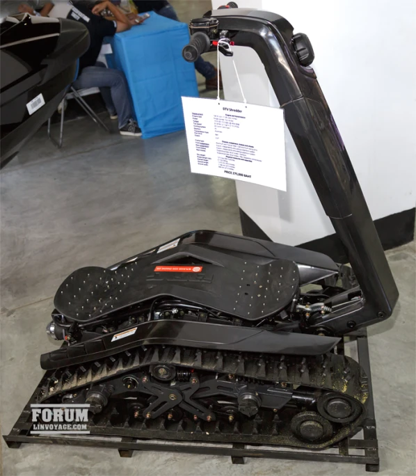 a pile of skates siting in the middle of a showroom