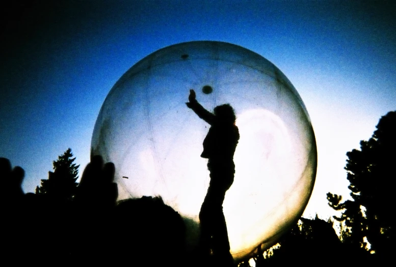 a person juggling a ball in the air