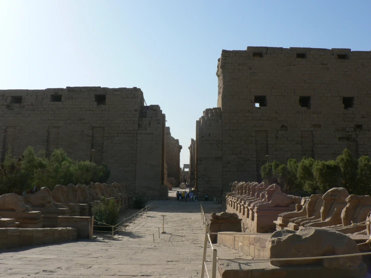 some big buildings that are next to some rocks