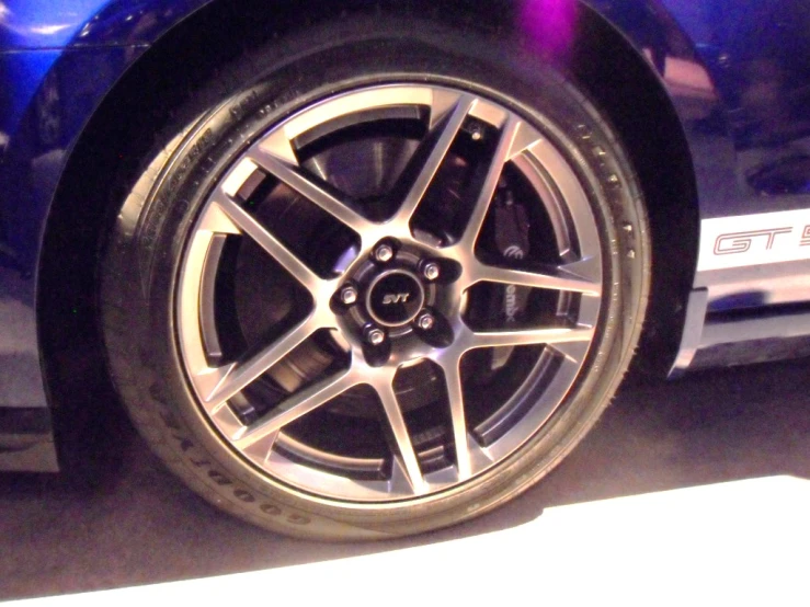 the rim on the tire of a sports car