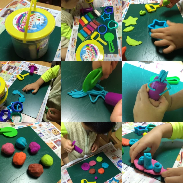 small children are working on colorful craft materials