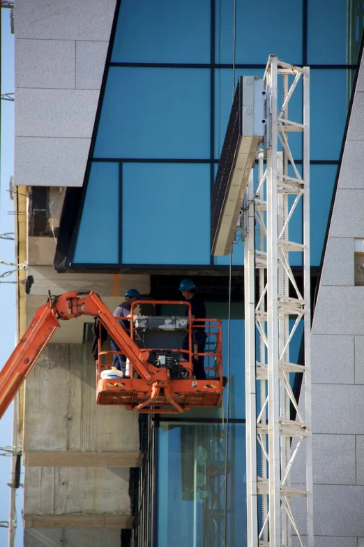 an image of a crane that is up in the air