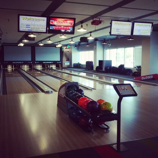 a bowling alley with several lanes for bowling