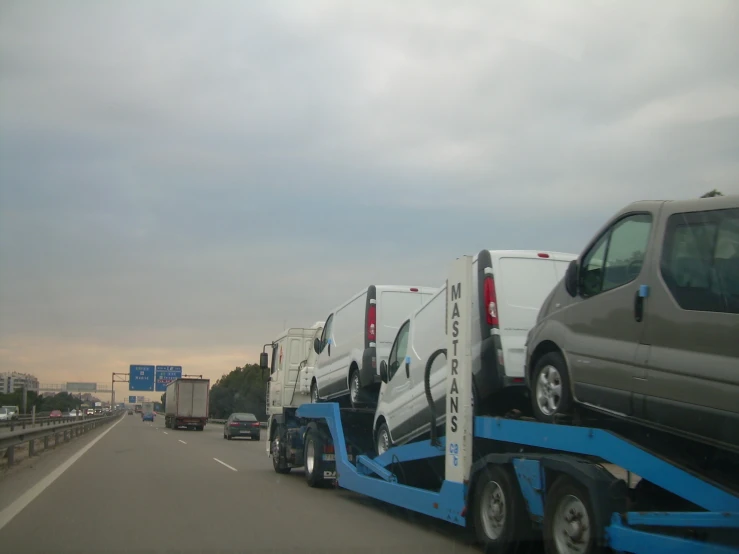 a tow truck pulls a car into the side