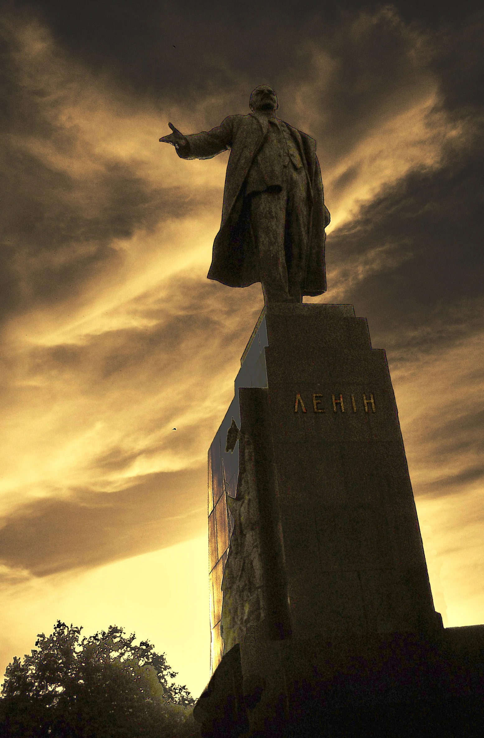 a monument with a statue in the middle of it