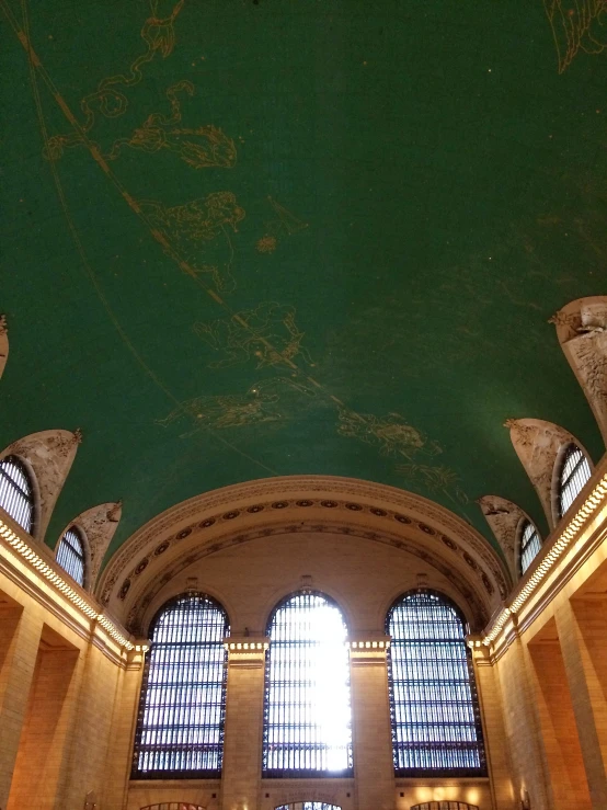 the vaulted ceiling of an indoor public liry