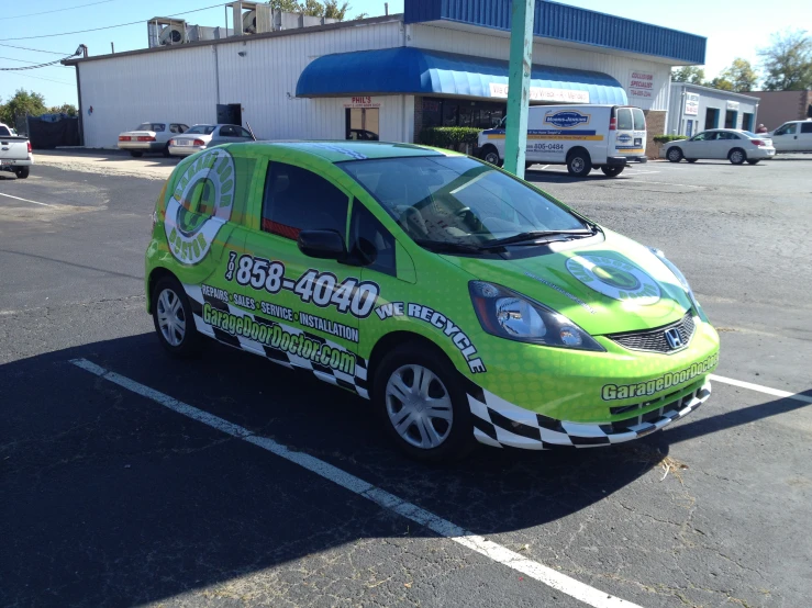 a vehicle parked in a parking lot next to a building