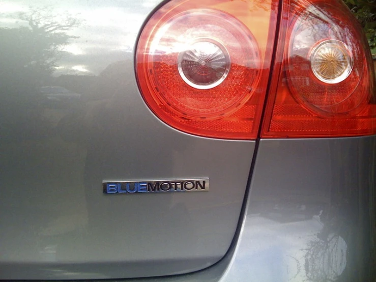 the taillights of a silver subarution vehicle