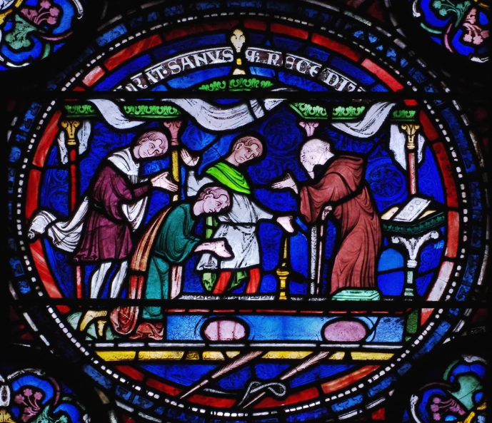 an image of stained glass with a person writing to a child