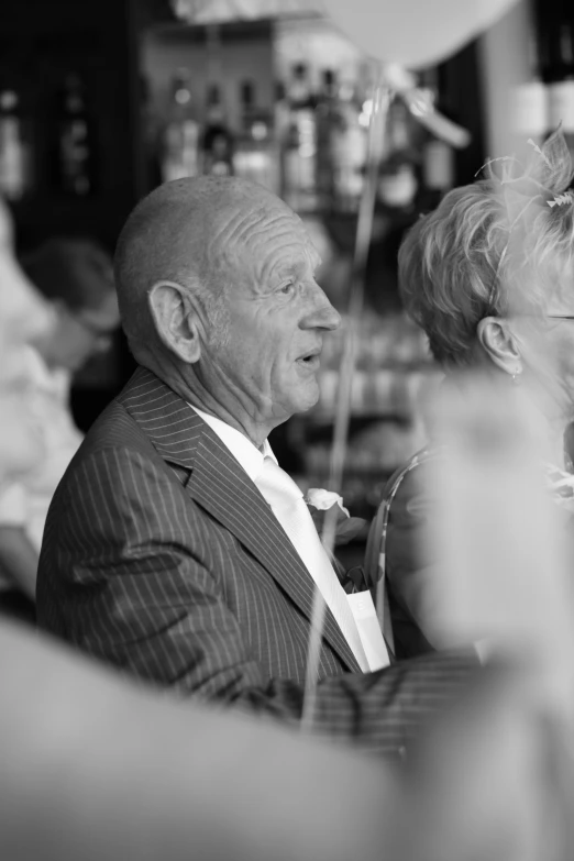 a couple of people sitting at a table