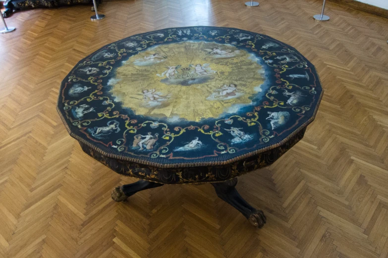 a table with an elaborate floral design on it