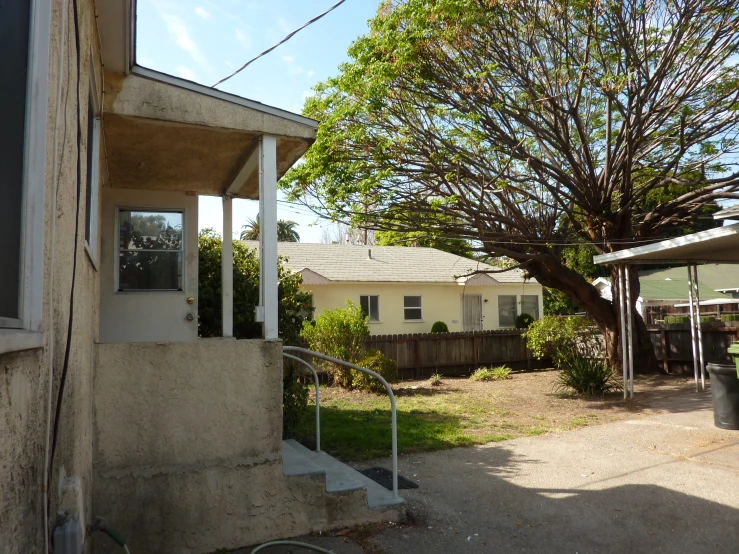 the small house has a door and window