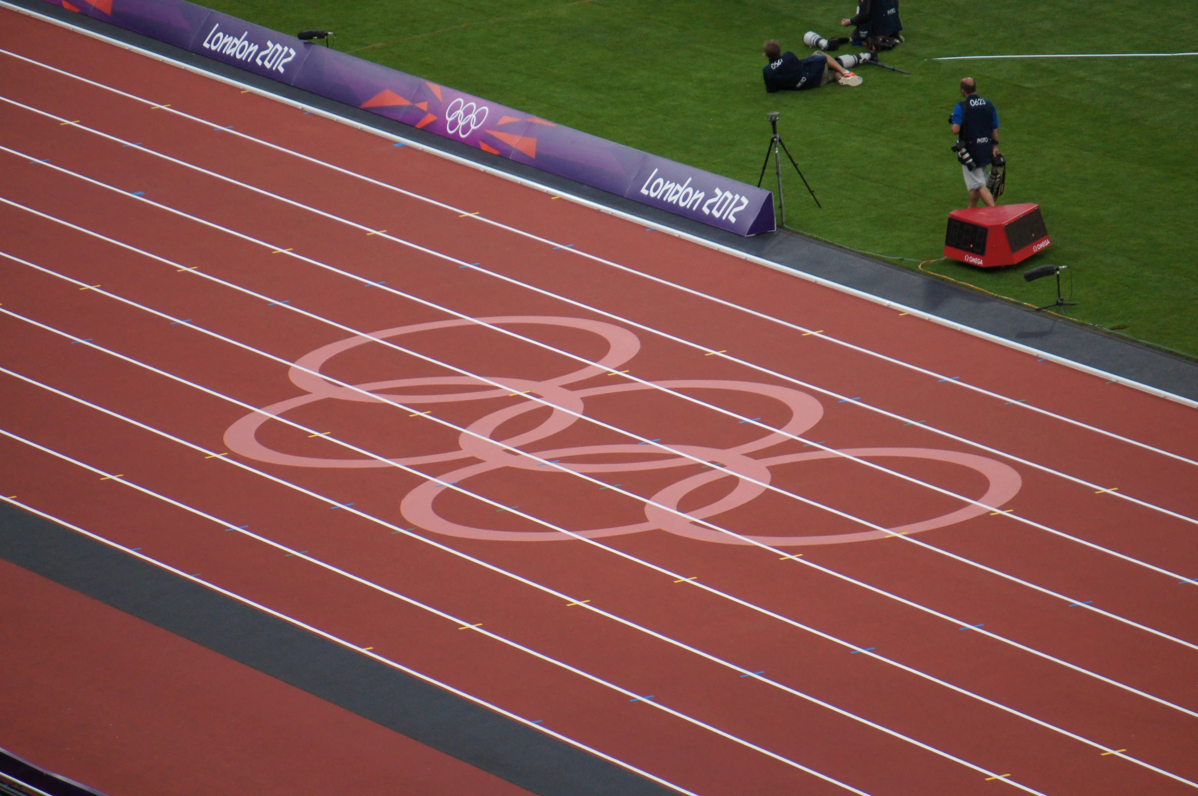 a close - up s of the olympic symbol on a track