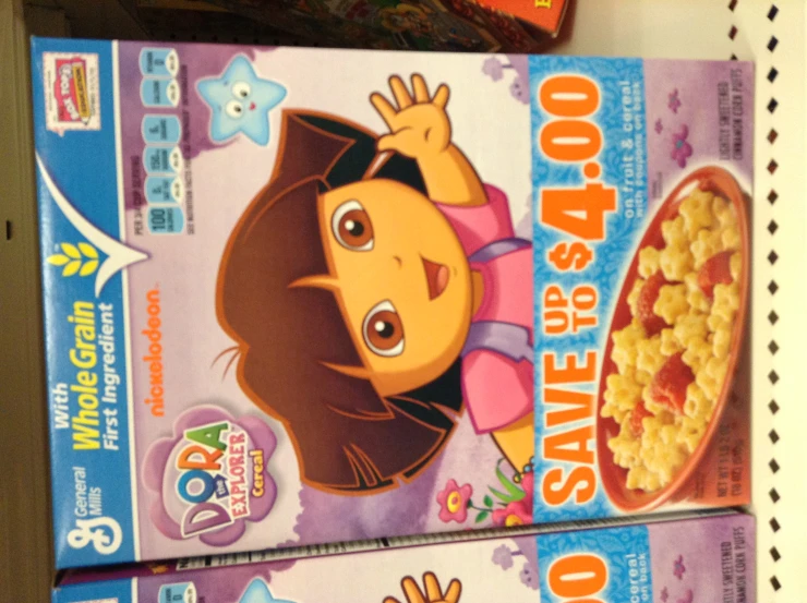 two boxes of cereal on a store shelf