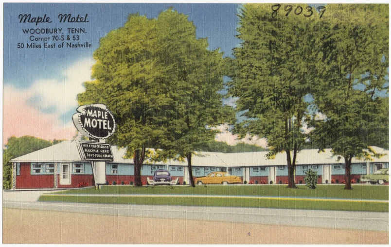a postcard with a motel and trees around it