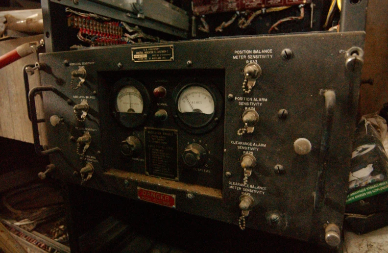 a close up of an old fashioned military radio