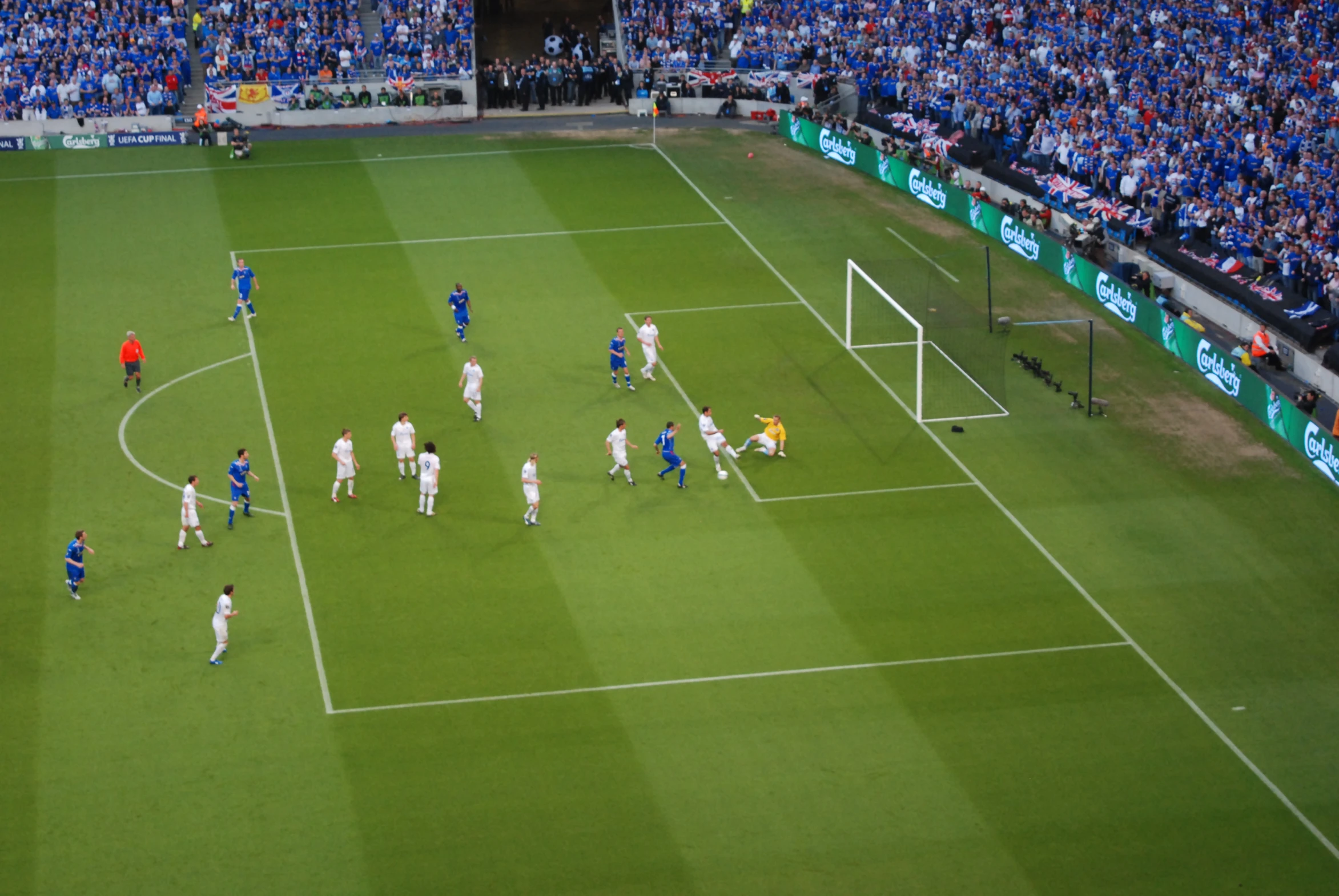 a group of soccer players standing on a field