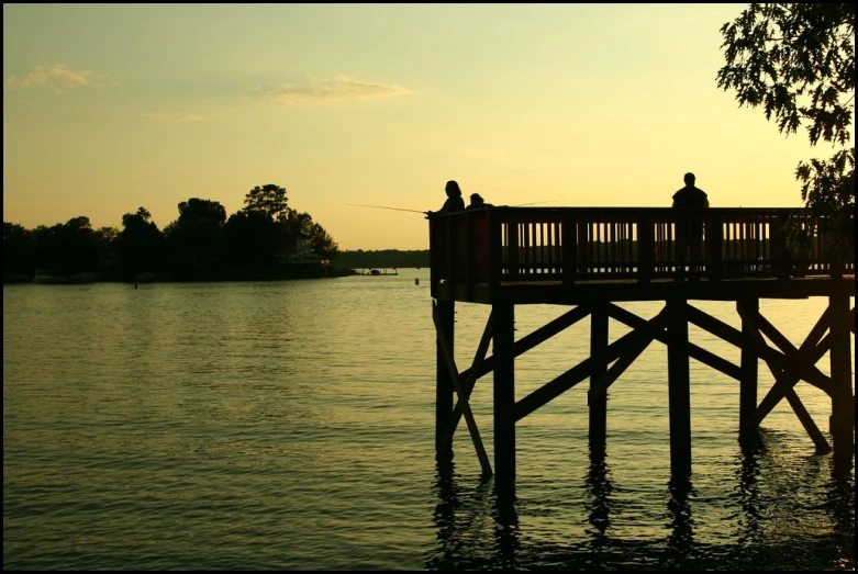 a bridge sitting next to a body of water