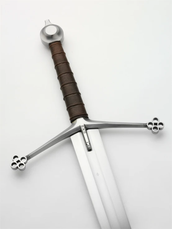 a large sword with the top section of the blade attached to it
