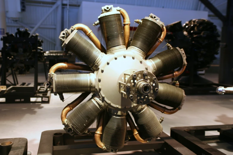 large metal industrial machinery displayed on table in room