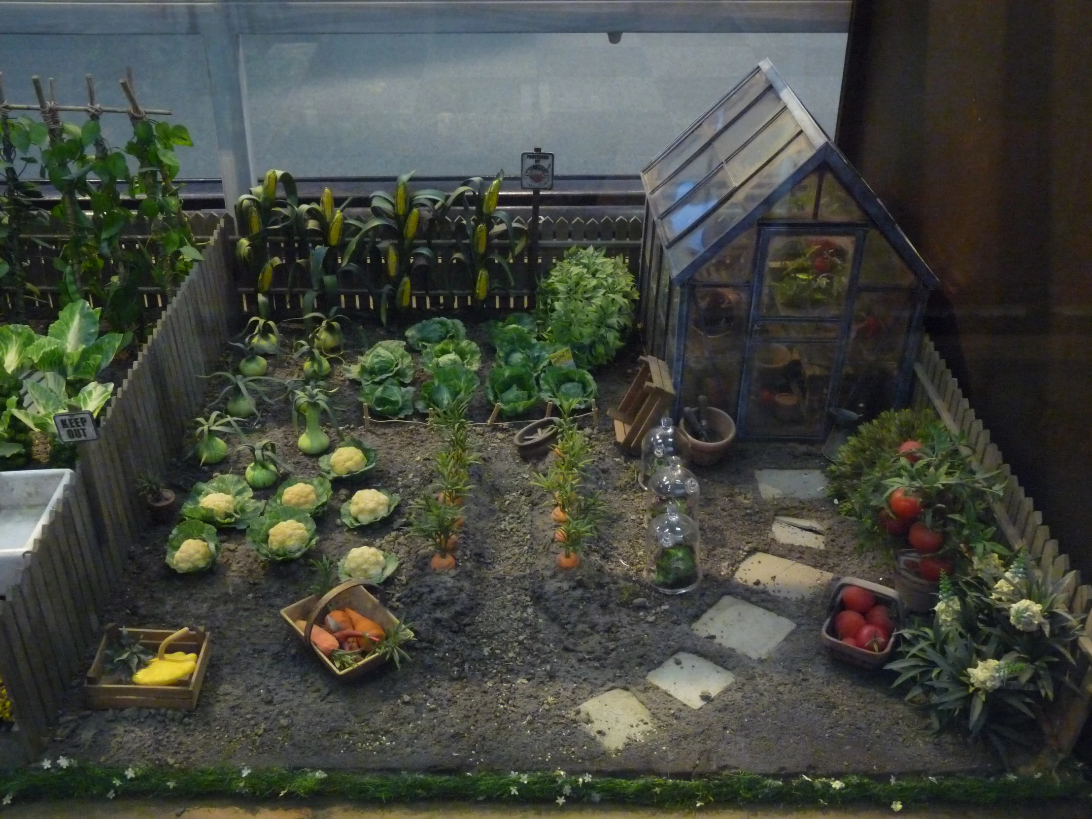 garden area with small scale structure including several plants