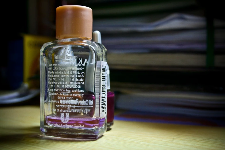 an empty clear bottle is on the table