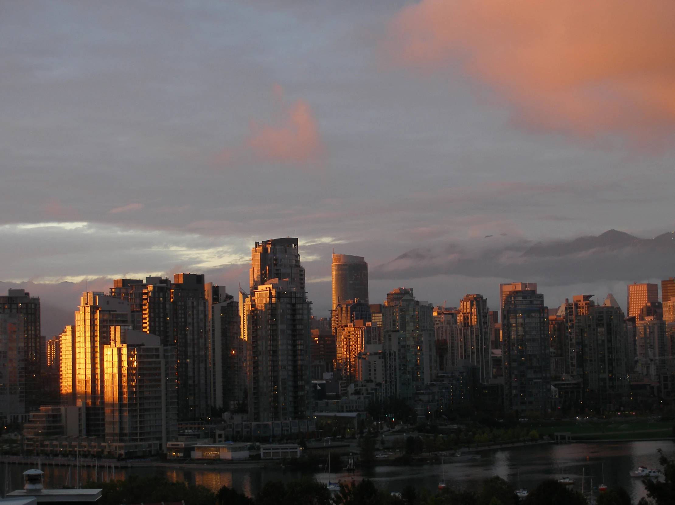 view of a city on the other side of a lake