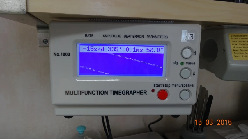 an analog multi function timer in a room