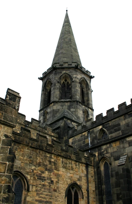 a view from below looking up at a tall tower