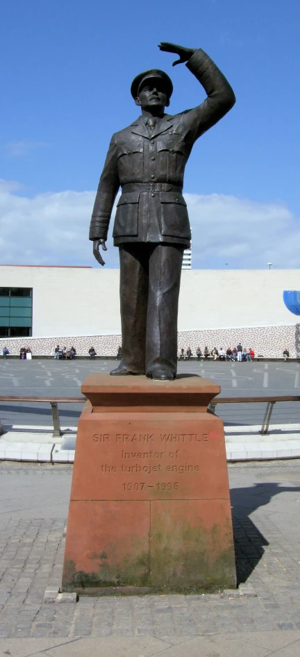 a statue of a man with a bird in his hand