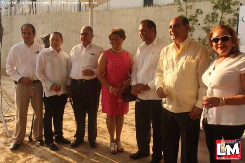 a group of people standing next to each other