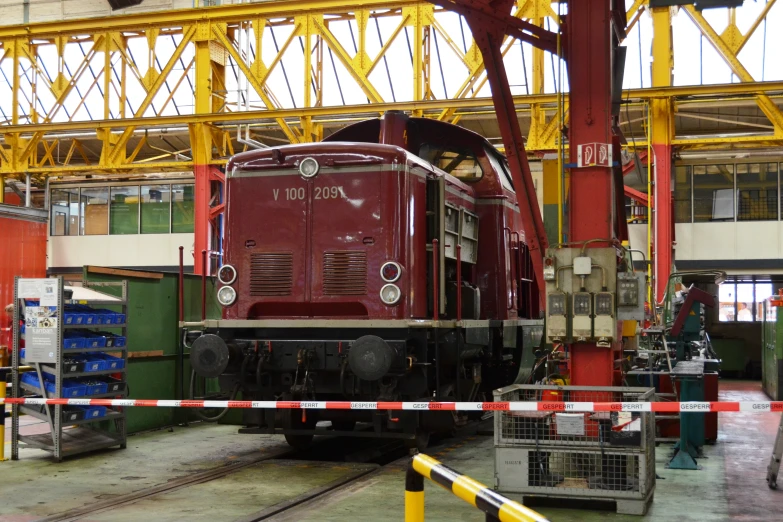 a train on display inside a railway station