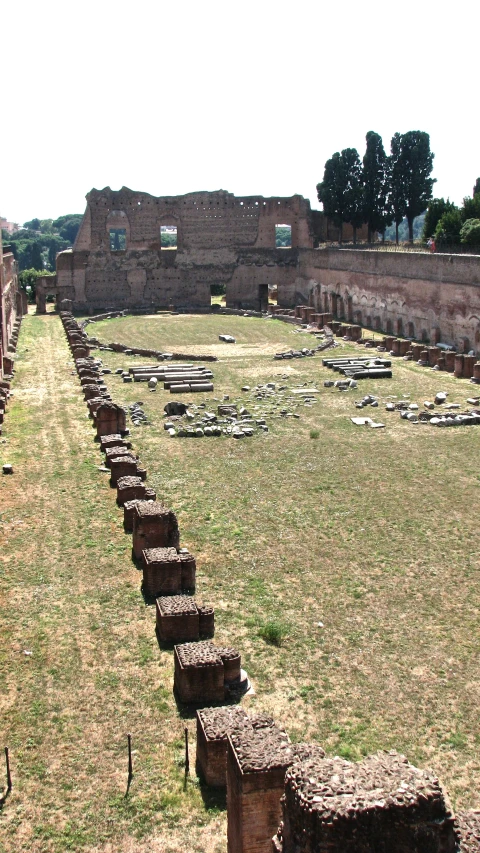 a large field with stones in the center