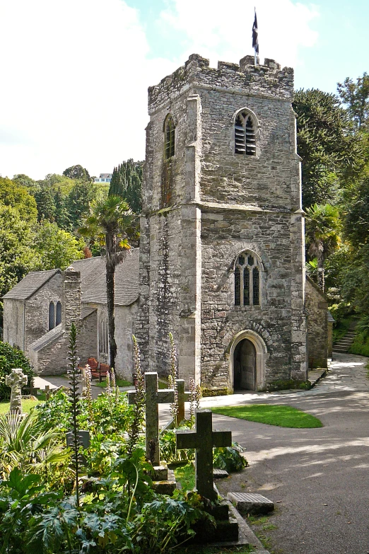 the tower on this old church has a clock displayed on it