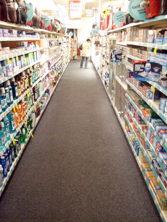 the aisle in a store with two children playing