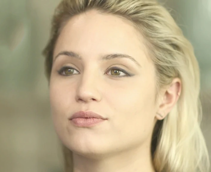 a close up po of a woman with blonde hair