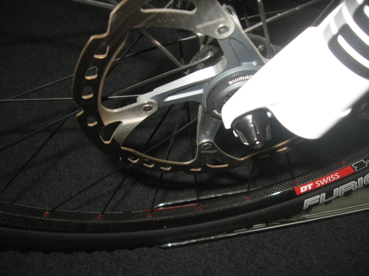 a close up s of the rear wheel on a bike