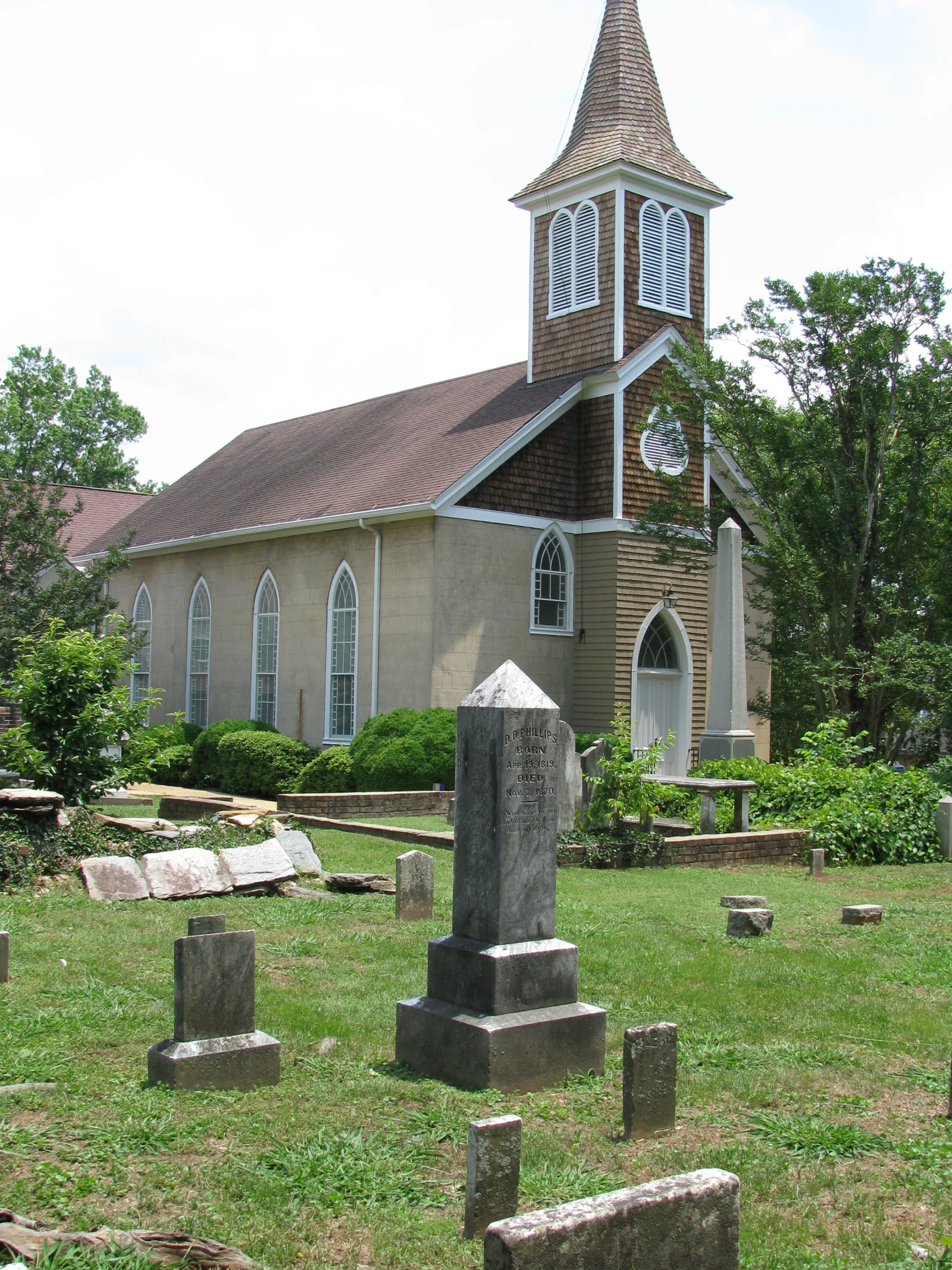 an old stone church building with a steeple
