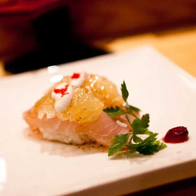 a piece of food sitting on top of a plate