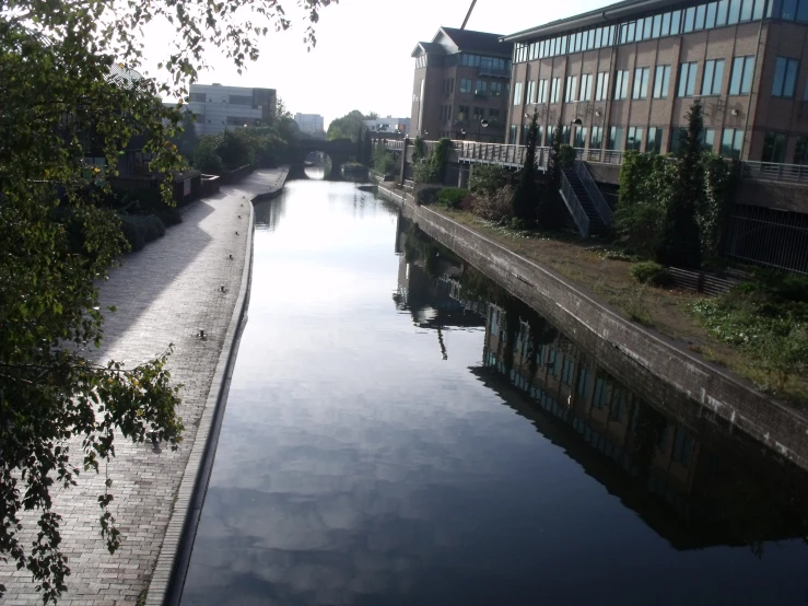 a river running through a city surrounded by tall buildings