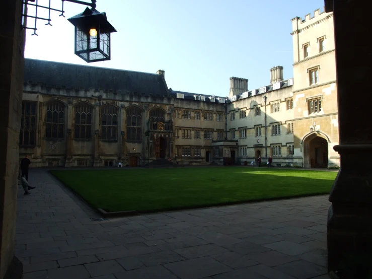 this is a large courtyard with green grass