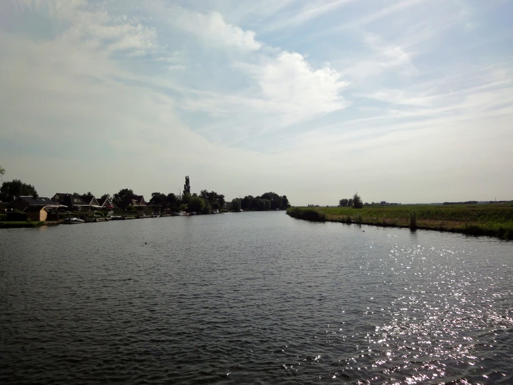 the water and land surround a small town