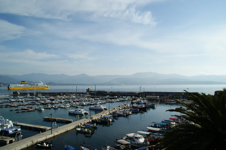 an overview image of a harbor filled with boats