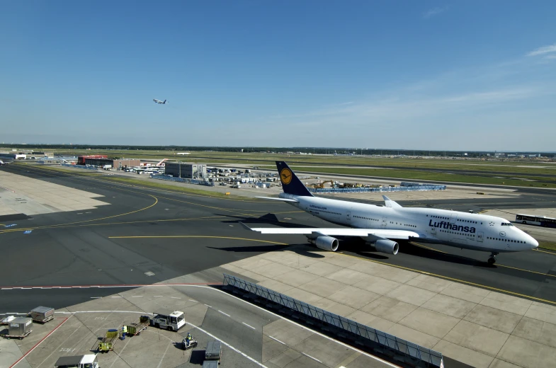 an airplane on the tarmac with a landing gear attached to it