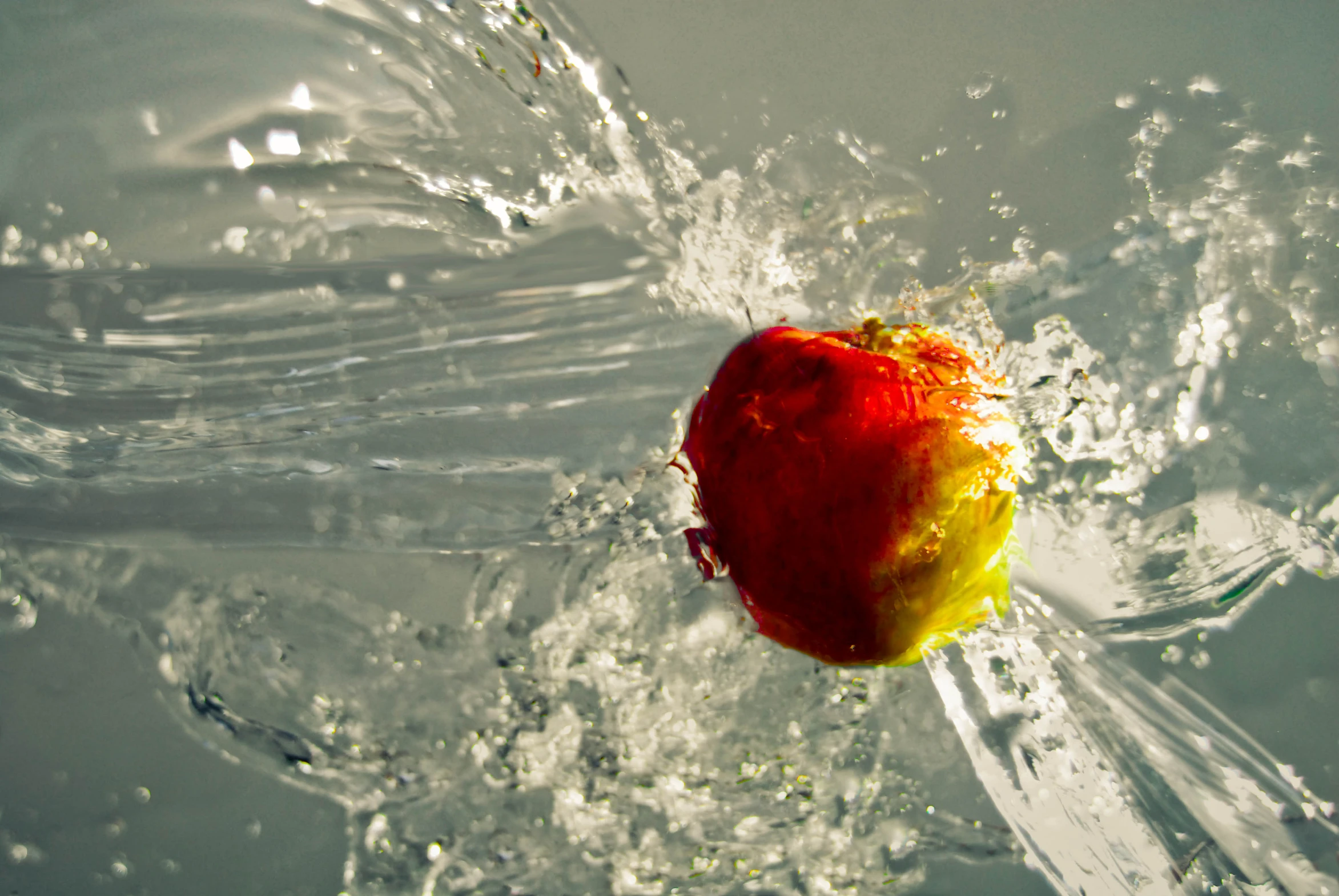 an apple is in the water after being boiled