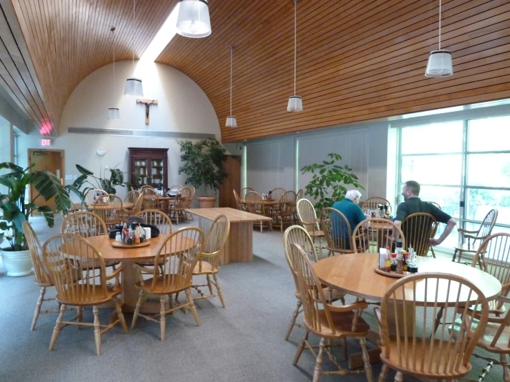 a room with many wooden furniture in it